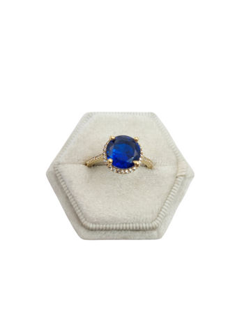 10K gold ring. Round blue stone. Size 7. CZ stone