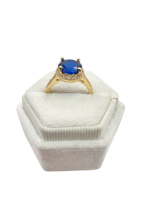 10K gold ring. Round blue stone. Size 7. CZ stone