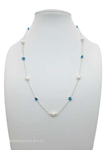 925 silver chain. Blue eyes and white stone. 20in. 1mm