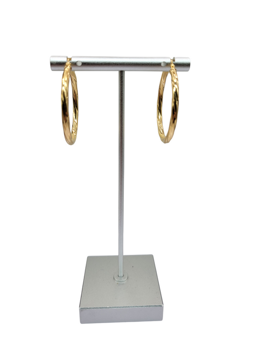10K gold earrings. Twisted. Size 5.