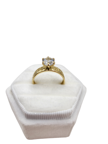 10K gold wedding band. CZ stone. Size 8.