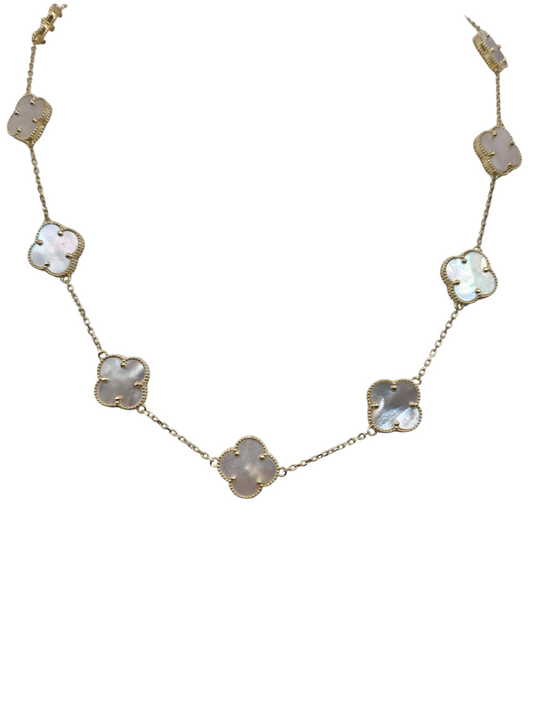 10K gold necklace. Flores blancas. 16in . 1.3mm