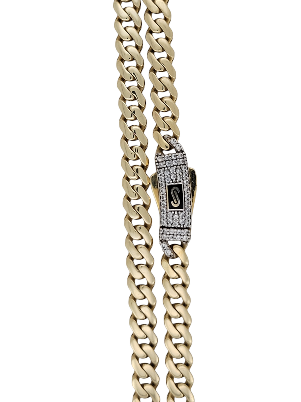 10K gold Cuban chain. Clasp with CZ stones. 22in .5mm
