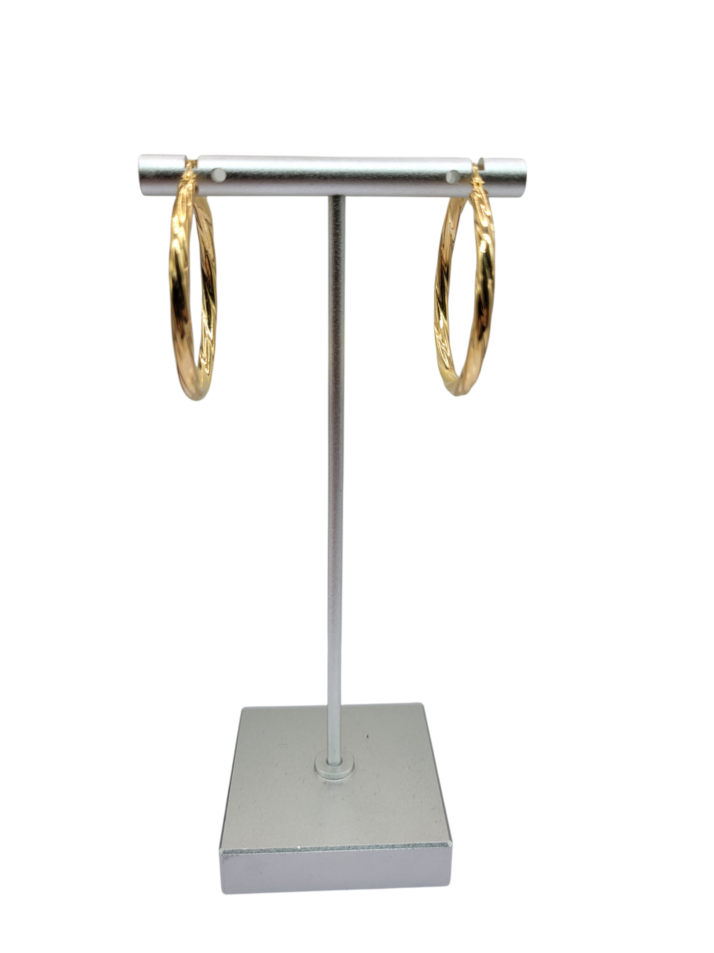 10K gold earrings. Twisted. Size 4