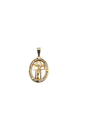 10K gold pendant. Oval crucifix. CZ stone.