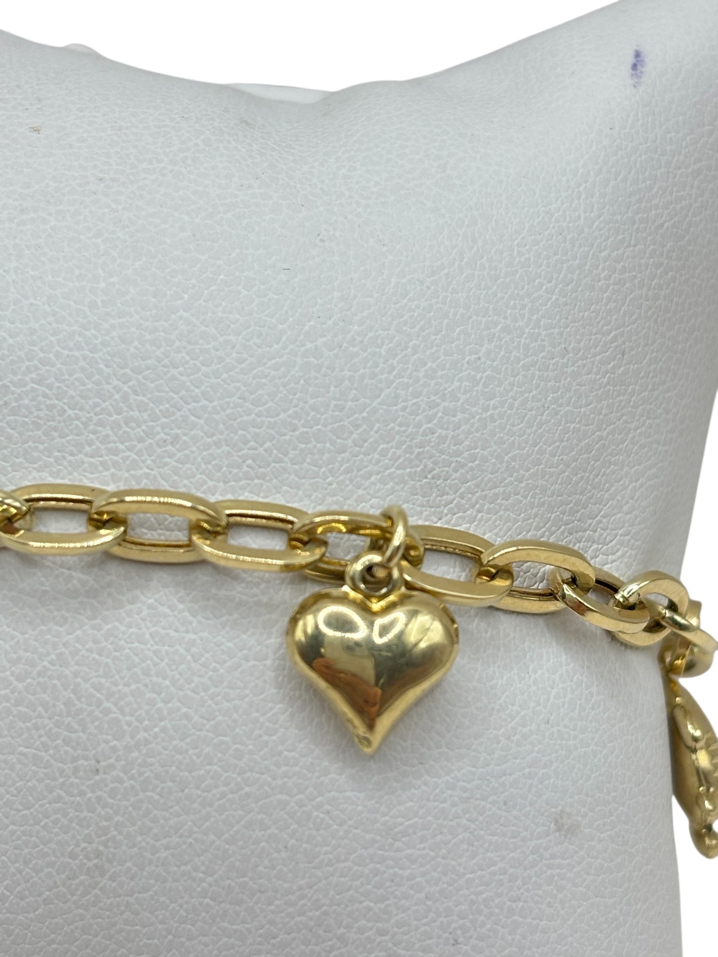 10k gold bracelet with charms of turtles and hearts 8in 4.6mm