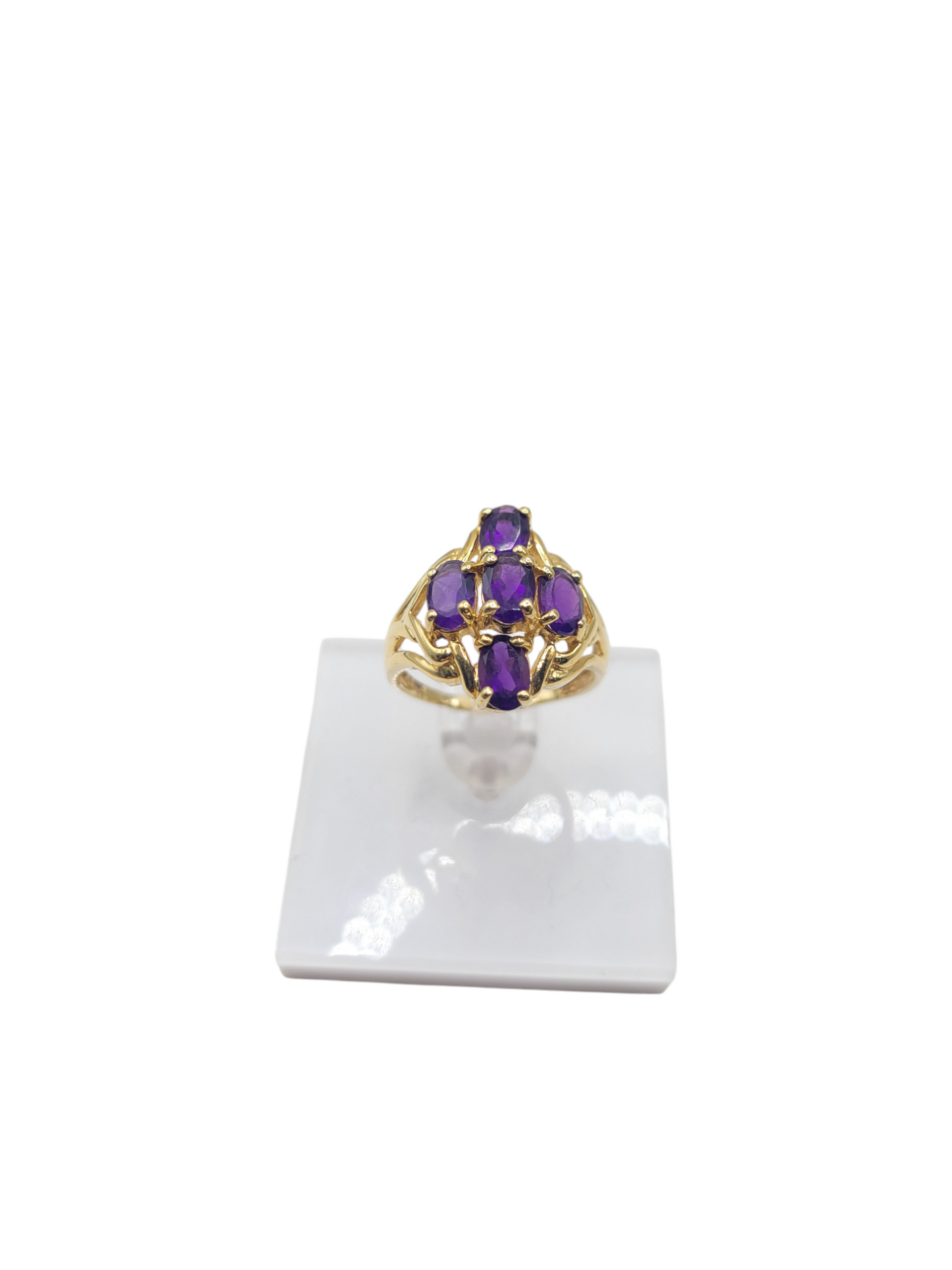 14K gold ring. Cross design with purple CZ stone
