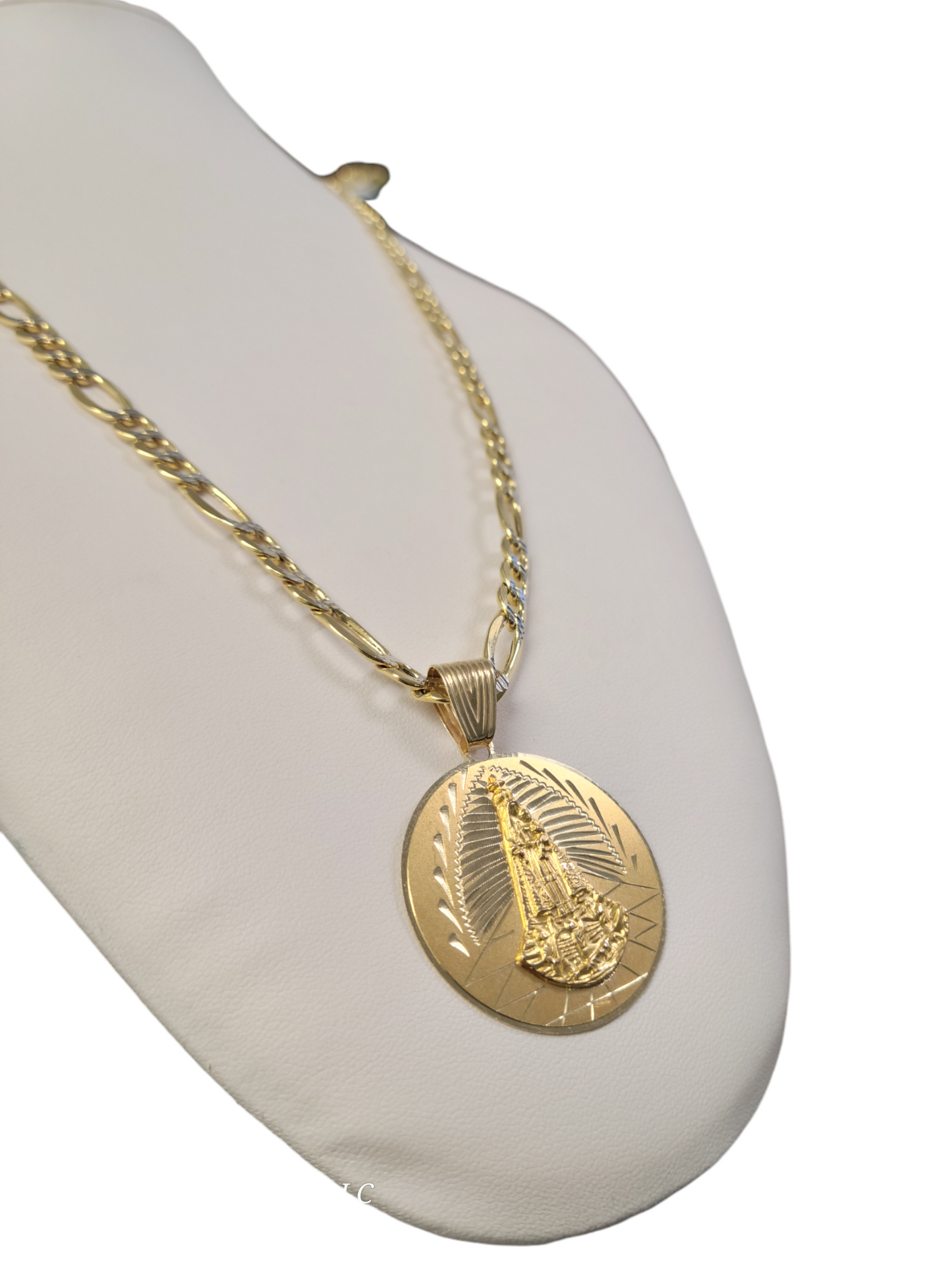 14k gold figaro chain with 14k virgin of charity pendant. 24in. 7.5mm