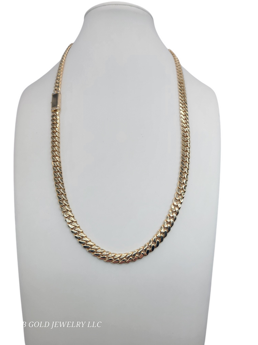 10K gold 24in 7mm Cuban chain.  80.4g with real diamonds