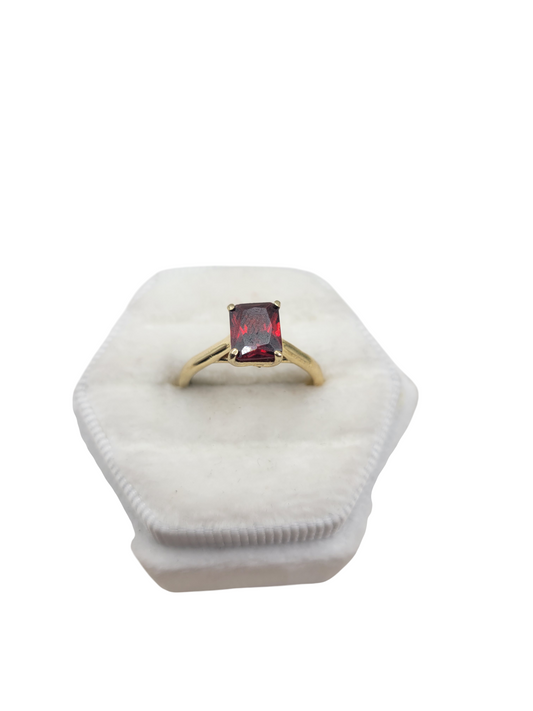 10K gold ring. Red CZ stone . Size 6.5