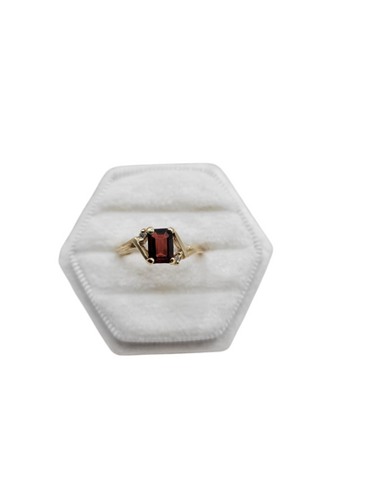 10K gold ring with a rectangular red stone. Size 6.5