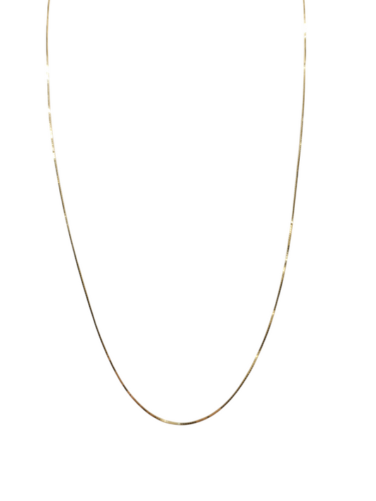 10K gold chain. plain . 18in. 0.7mm