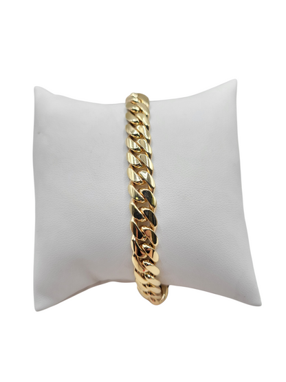 10K gold Cuban bracelet. Box clasp. 9in . 8.5mm