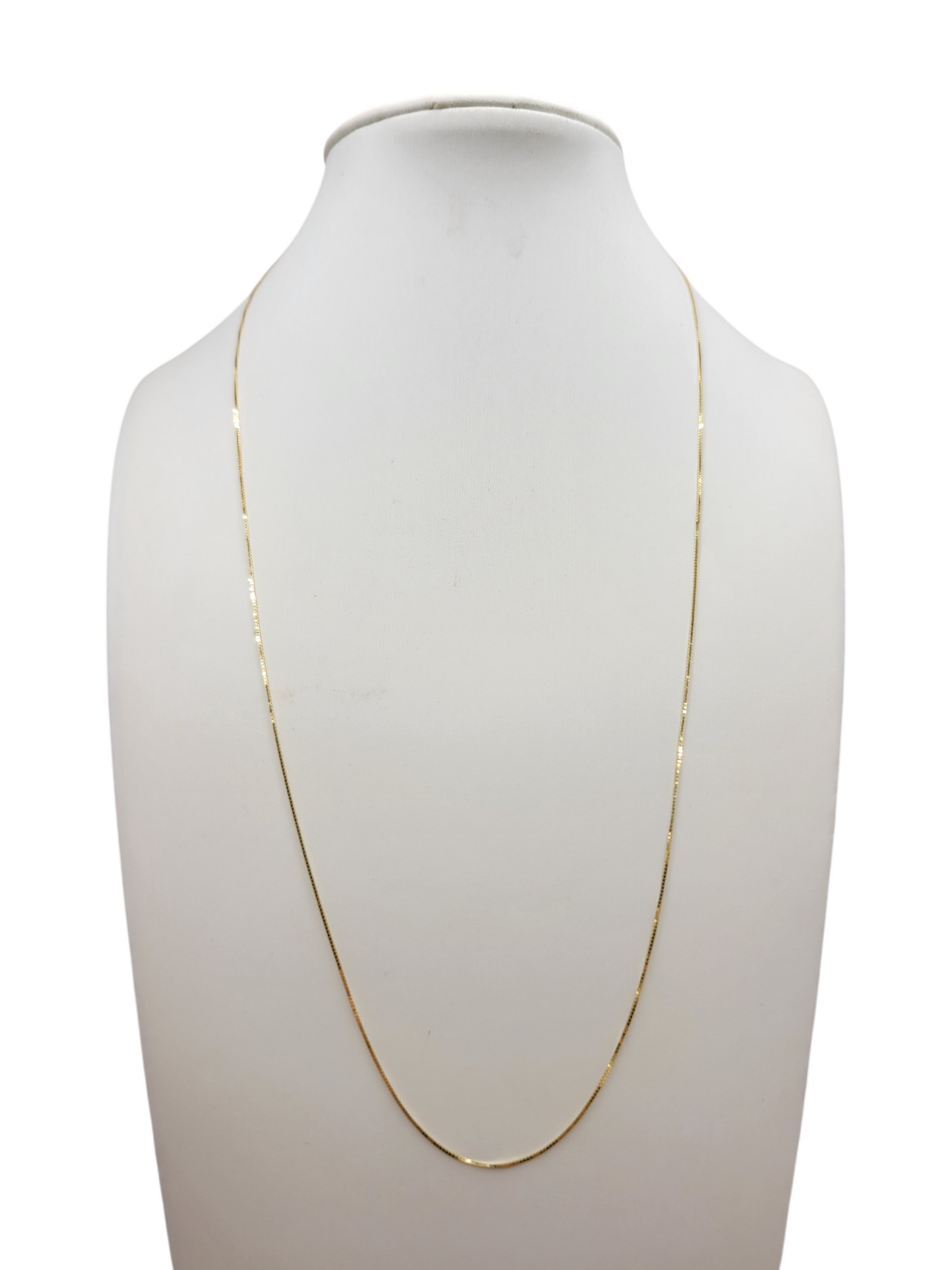10K gold chain. plain . 18in. 0.7mm