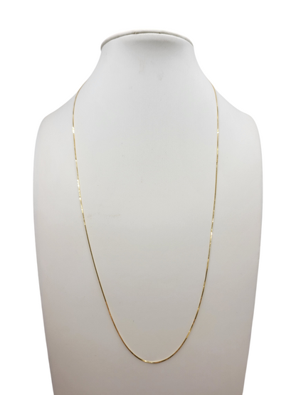 10K gold chain. plain . 18in. 0.7mm