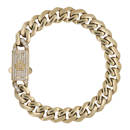 10K gold bracelet. Clasp with CZ stone. 7in . 9mm