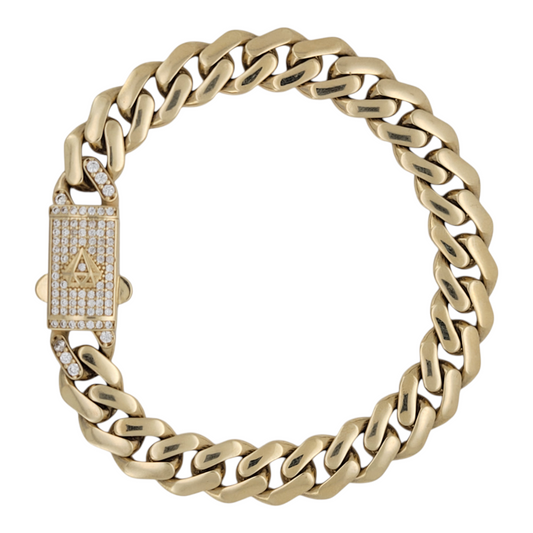 10K gold bracelet. Clasp with CZ stone. 8in . 9mm