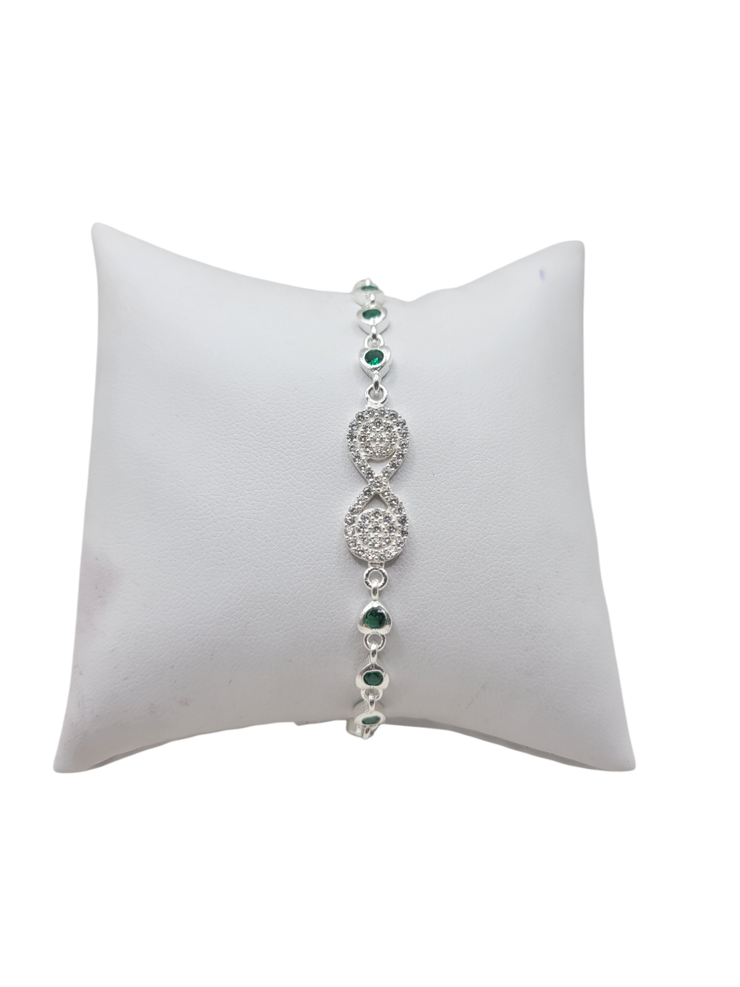 925 silver bracelet. Infinity symbol with green CZ stones. 8 inches. 2 mm.
