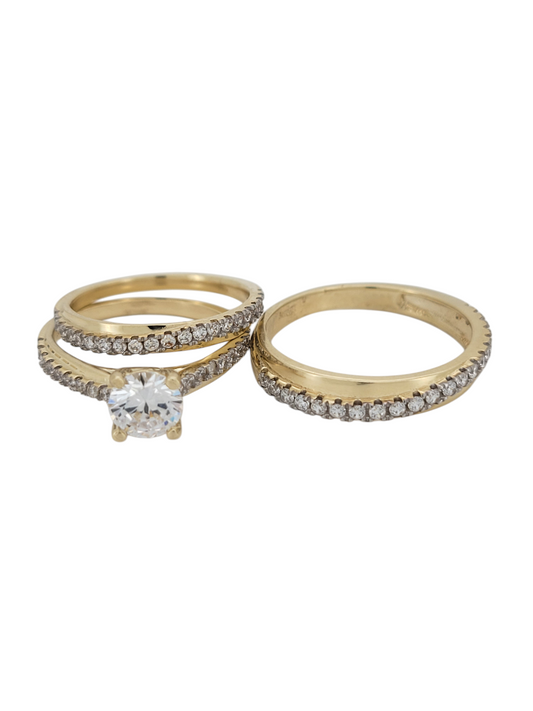 10K gold rings. Wedding trio. Two women's rings and one men's ring. Sizes 7 and 10. CZ stones.