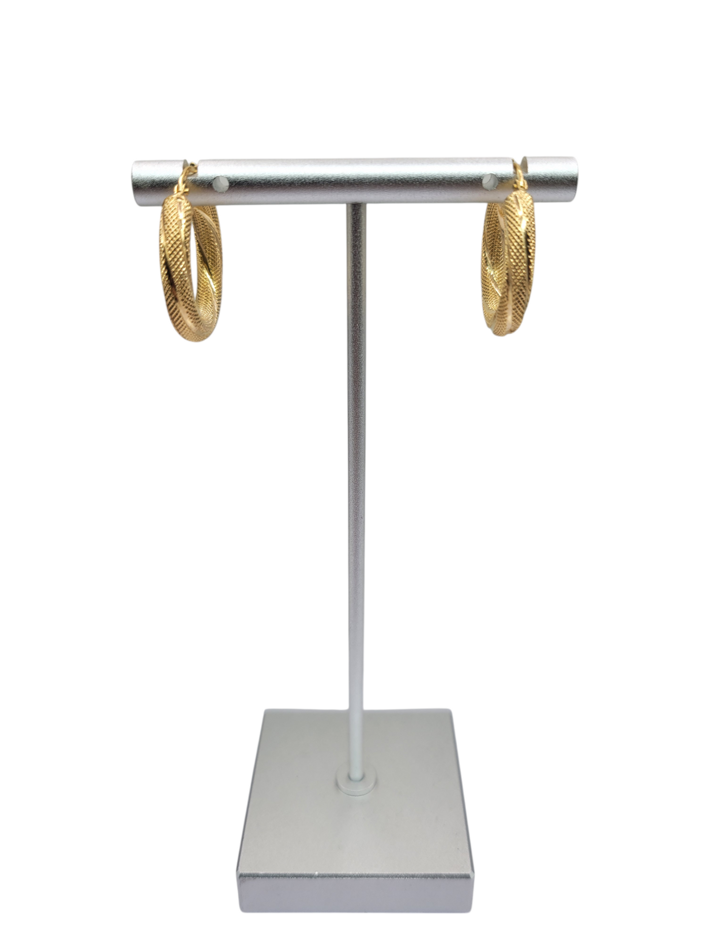 10K gold earrings. Medium thick snowy hoops. Size 2.