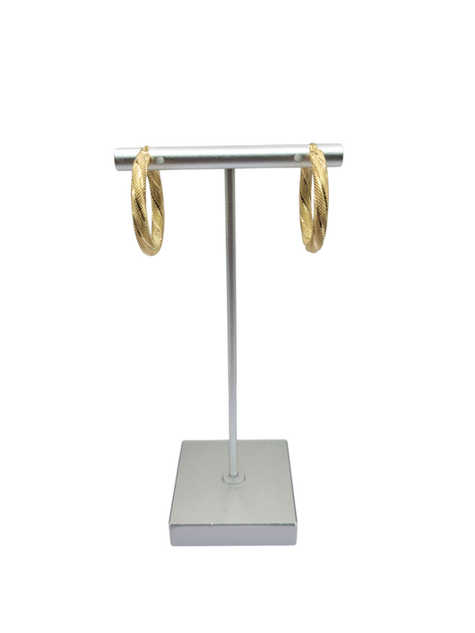 10K gold earrings. Medium-thick snowy hoops. Size 3.