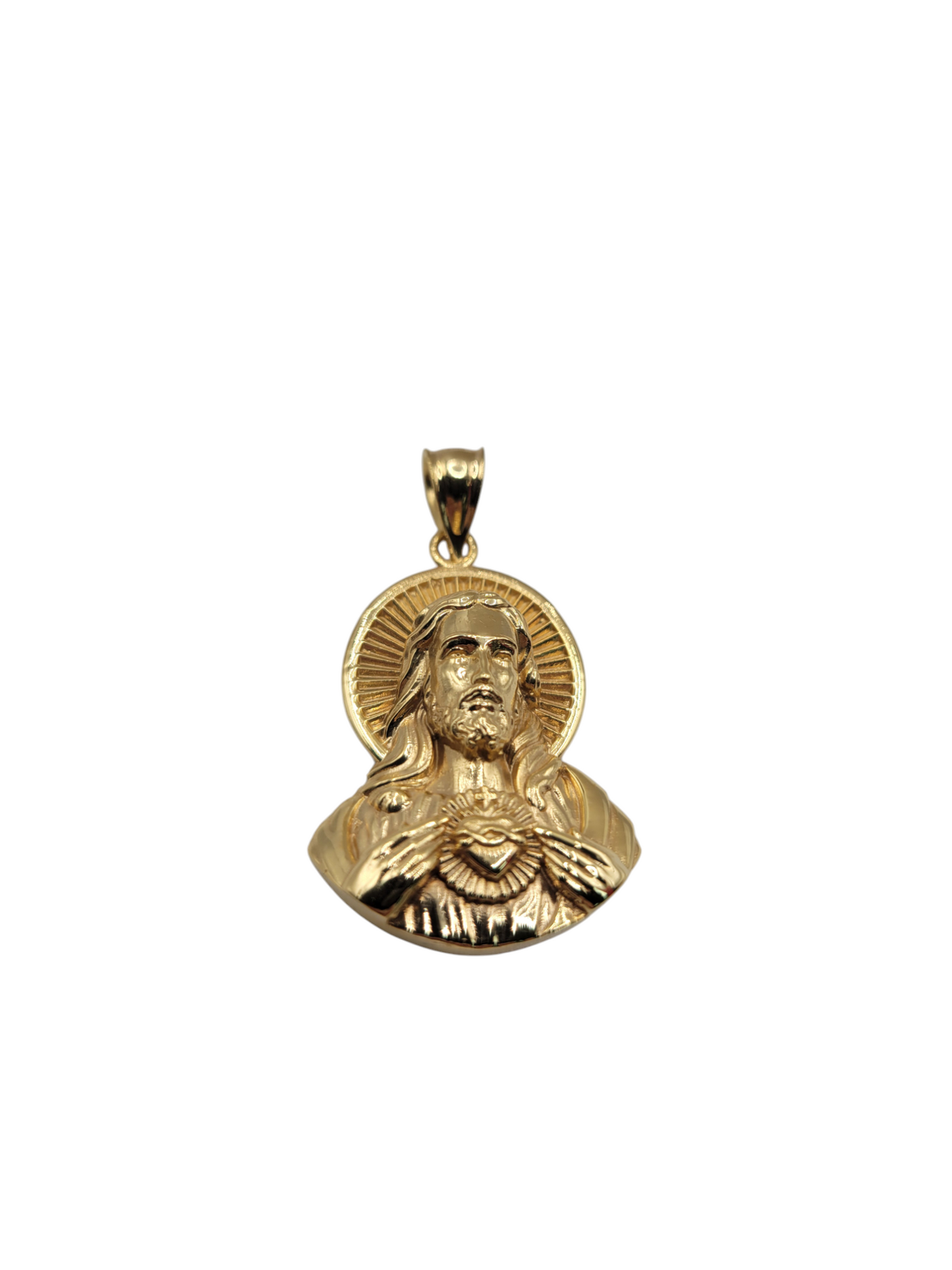 14K gold pendant. Jesus in relief.