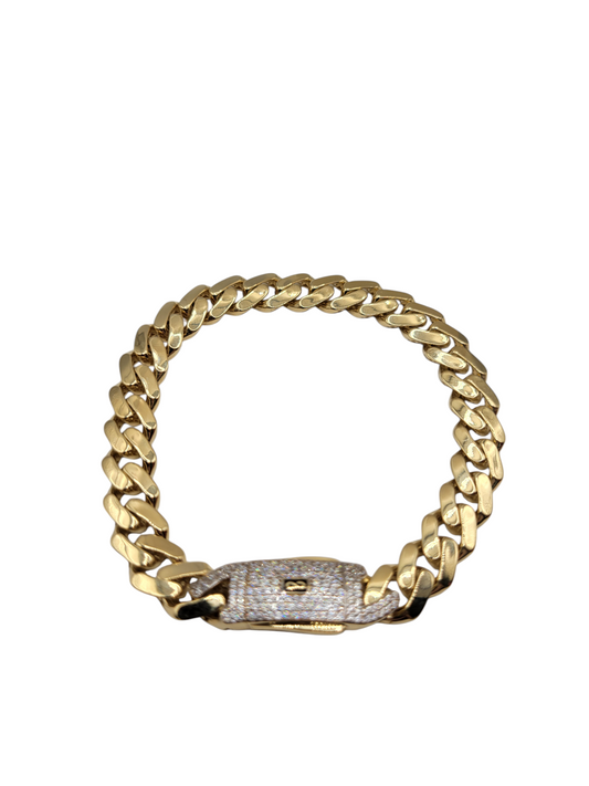14K gold bracelet. Clasp with CZ stone. 8in . 9mm