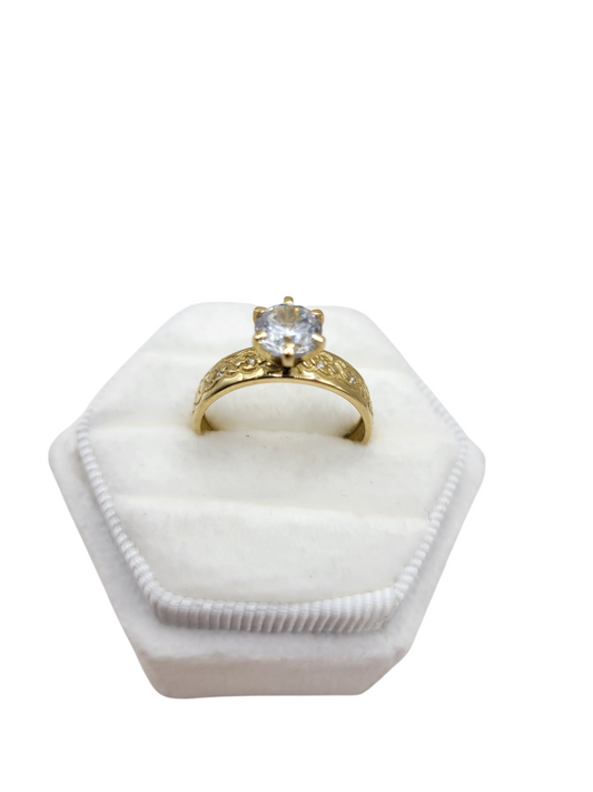 10K gold wedding band. CZ stone. Size 8.