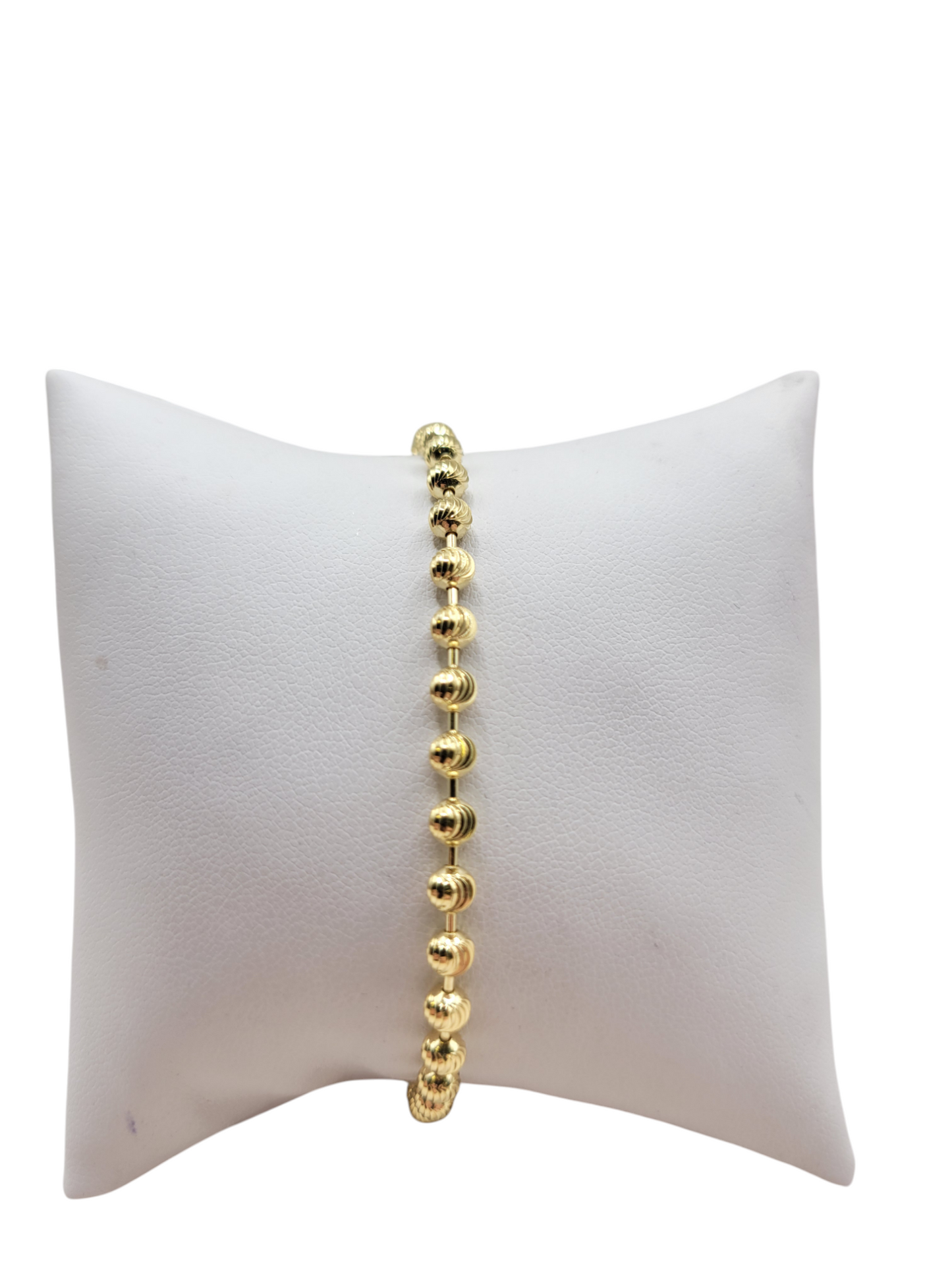 10K gold bracelet. Linked beads. 8 inches. 1-4 mm.