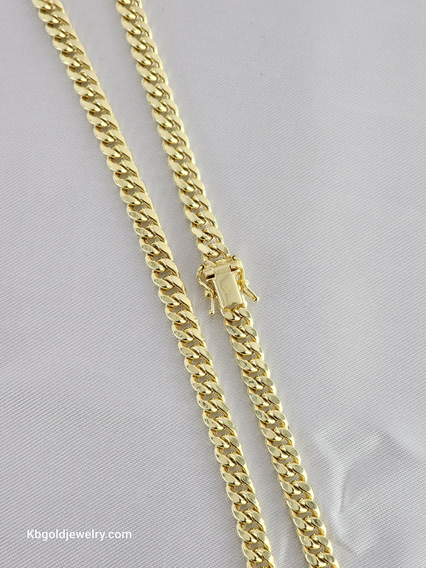 10k gold Cuban chain, size 22 and 18