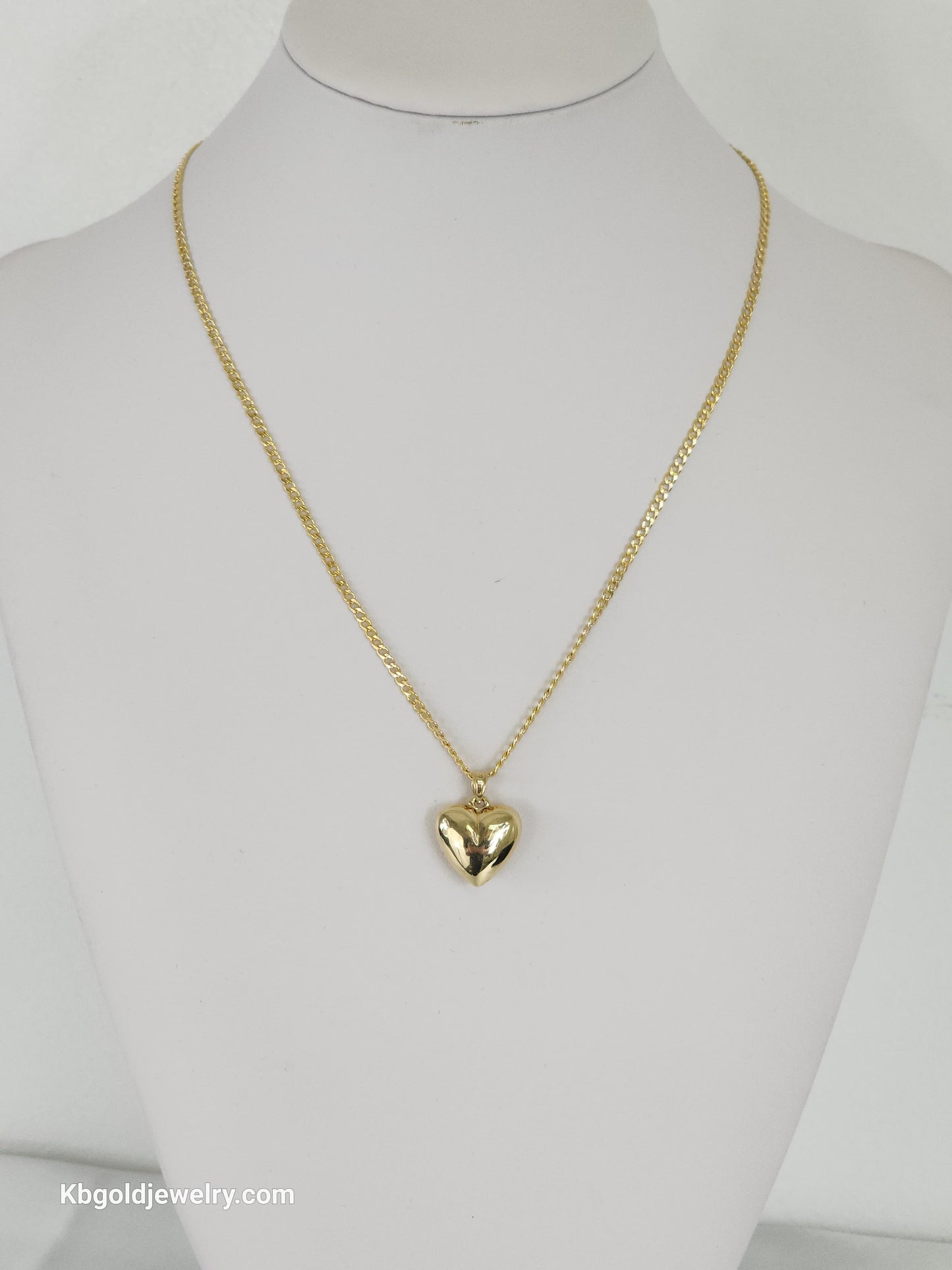 14K Cuban style gold chain with heart pendant