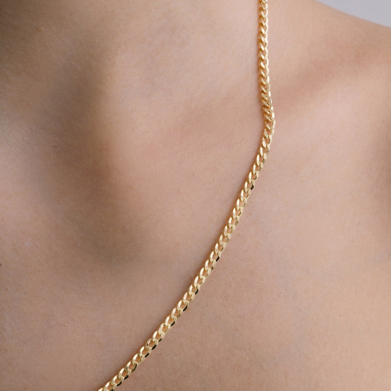 10K gold Cuban link chain. Brilliant cut style. 20in. 3.5mm