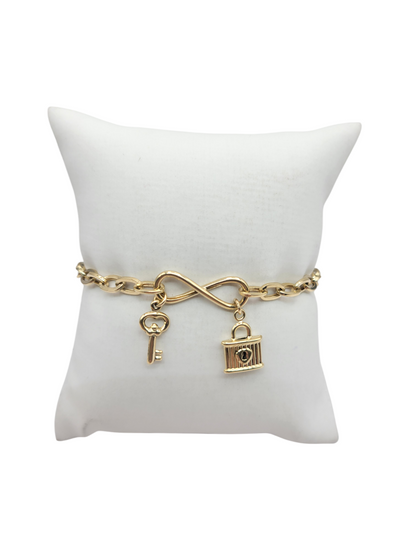 Gold bracelet 10K. key and lock. 7in. 4.6mm