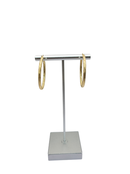 10K gold earrings. Thin snowy hoop. Size 4.