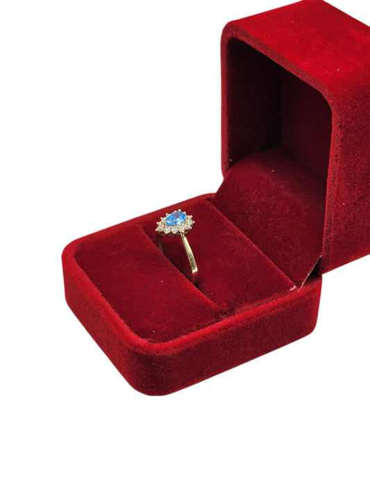10k gold ring with CZ Blue Stone. Size 7