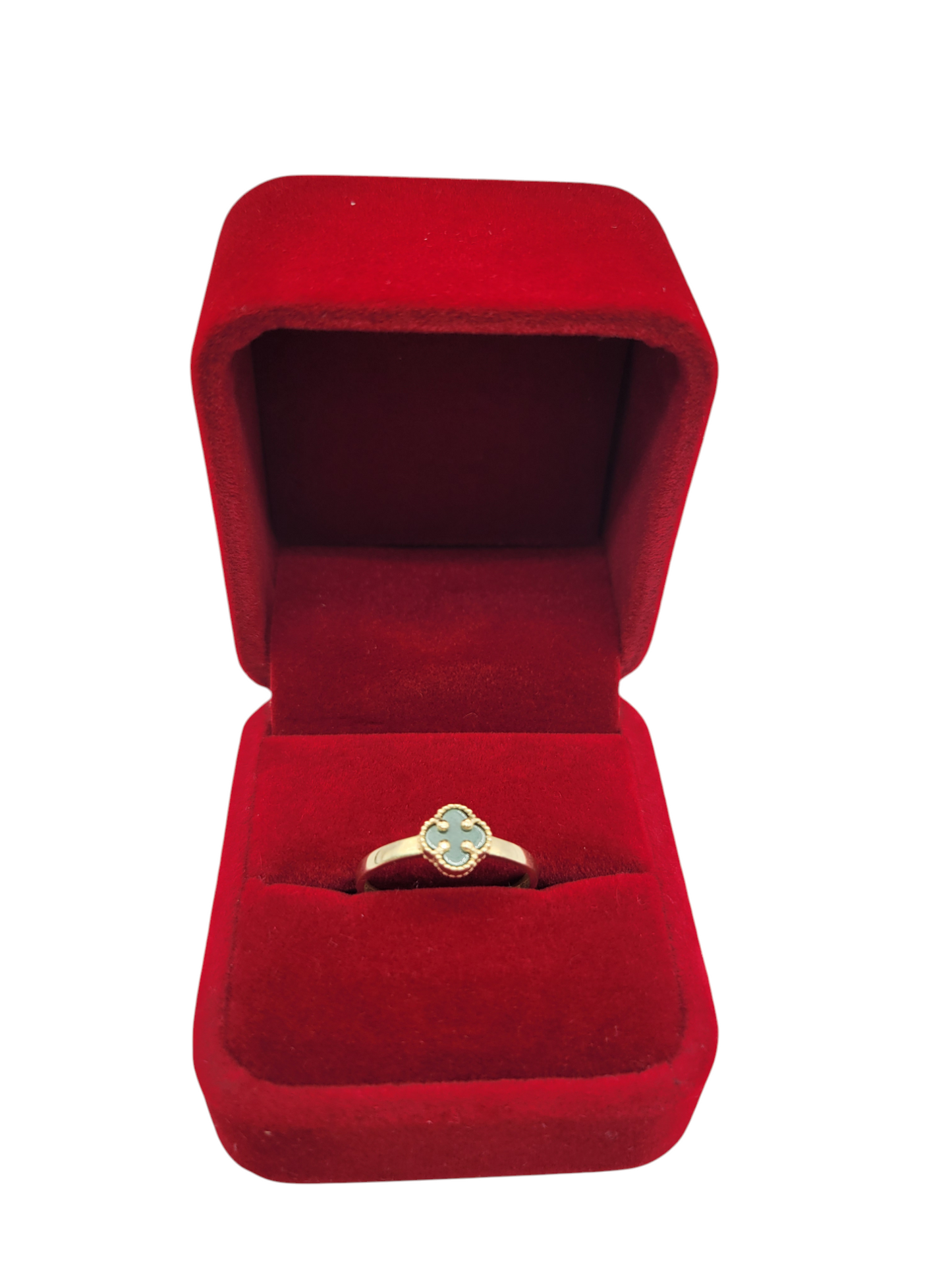 10K gold ring. Small green flower. Size 7