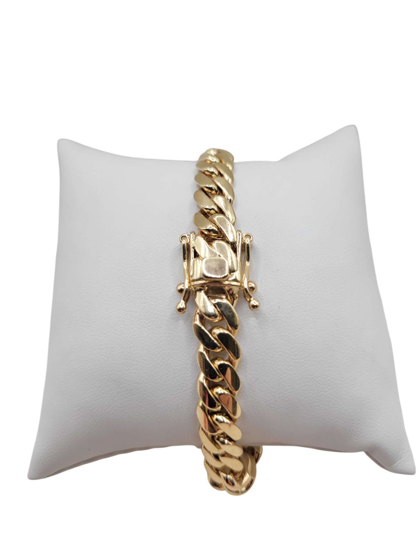 10K gold Cuban bracelet. Box clasp. 9in . 8.5mm