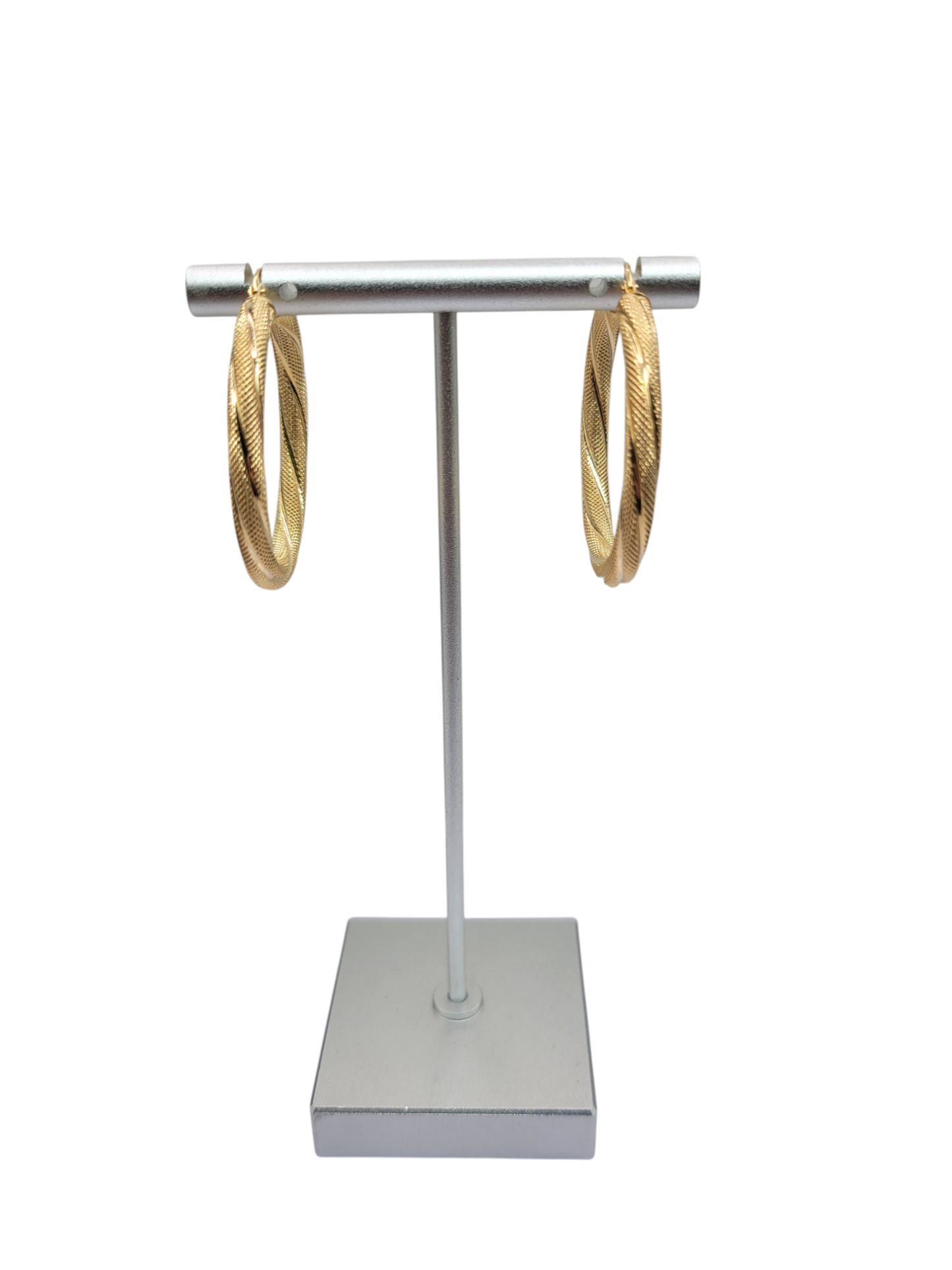 10K gold earrings. Medium thick snowy hoops. Size 5.