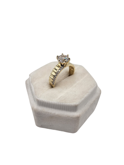 14K gold wedding ring with CZ stones. Size 7