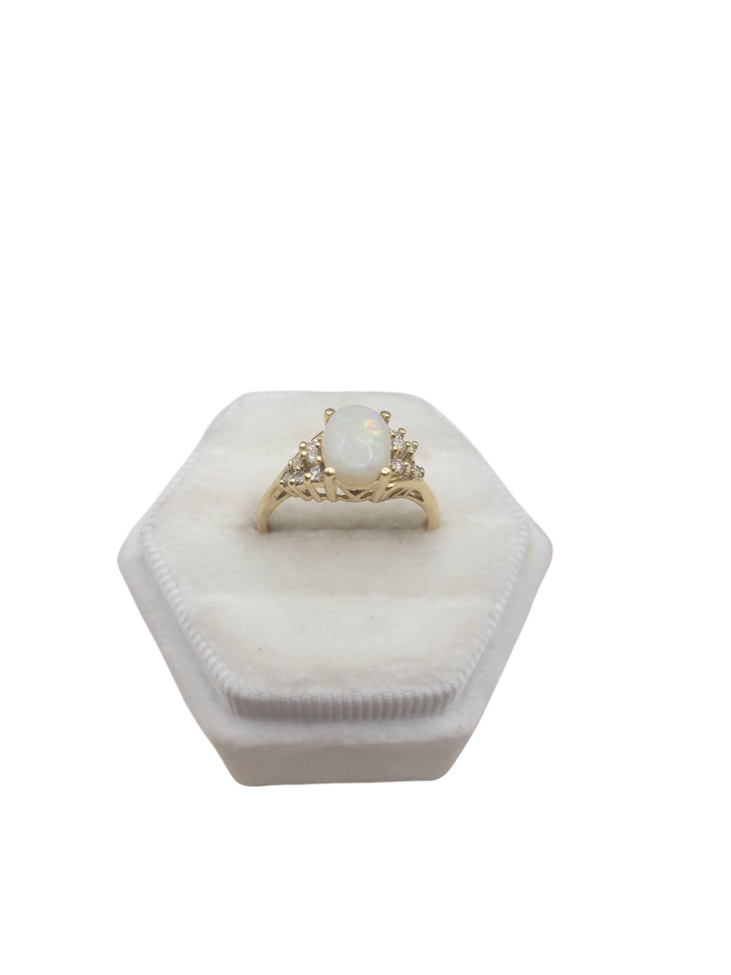 14K gold ring with real diamonds and an oval opal center. Size 8.