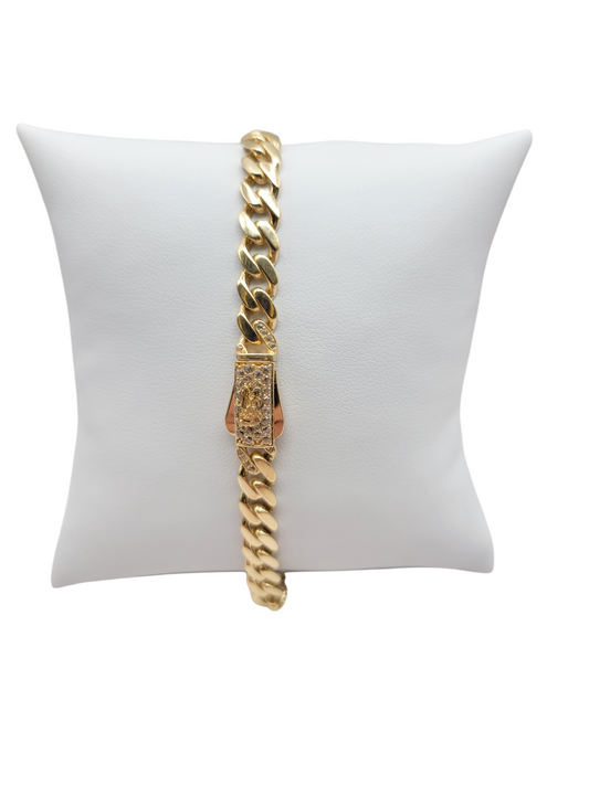 10K gold bracelet. CZ stone clasp. 8in . 6mm