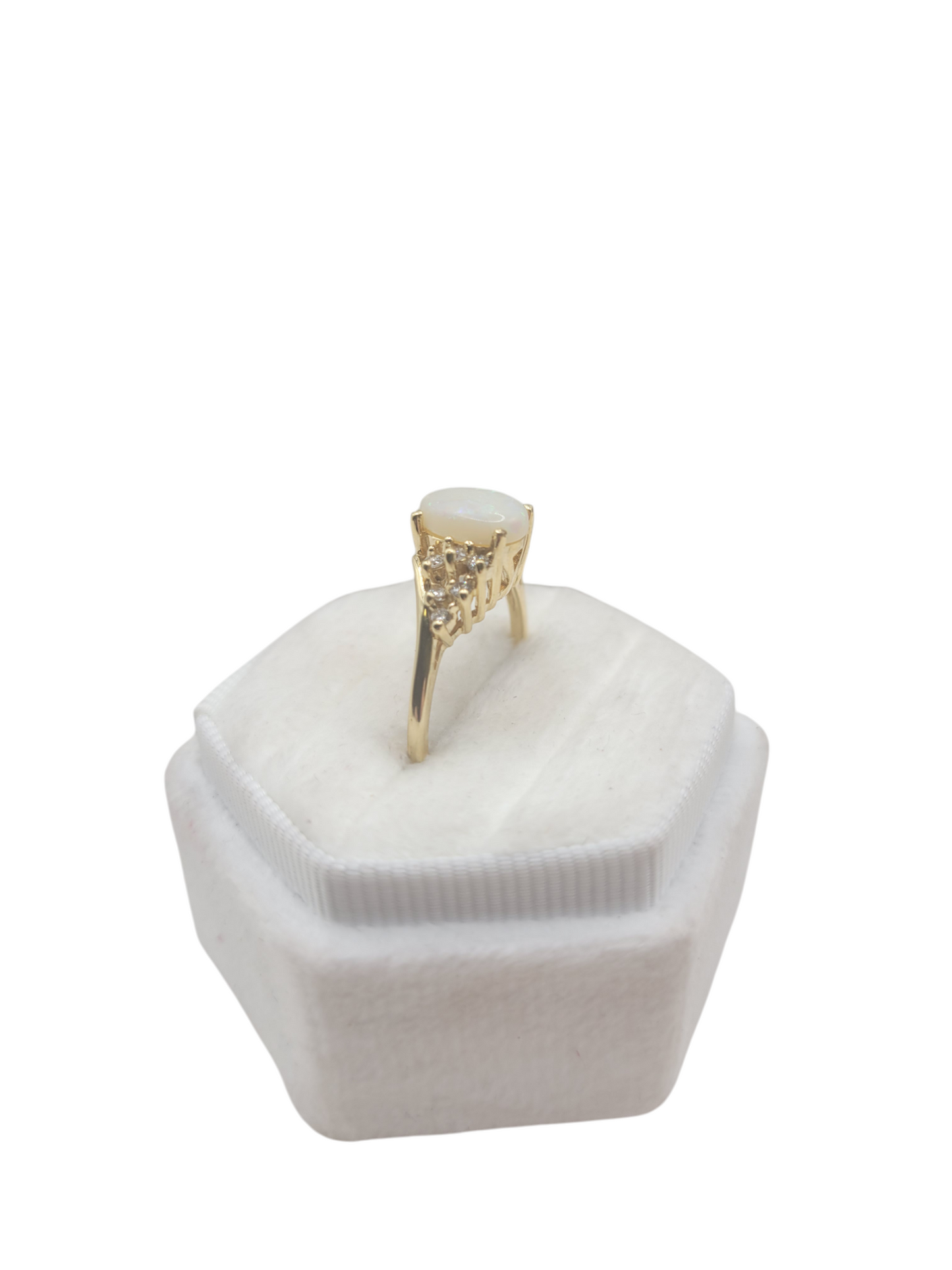 14K gold ring with real diamonds and an oval opal center. Size 8.