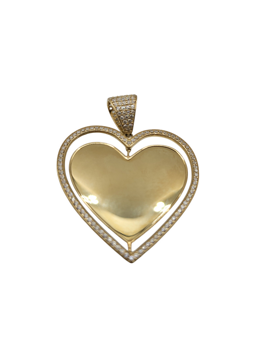 10K gold pendant. Heart that rotates on its axis... you can personalize it with a photograph