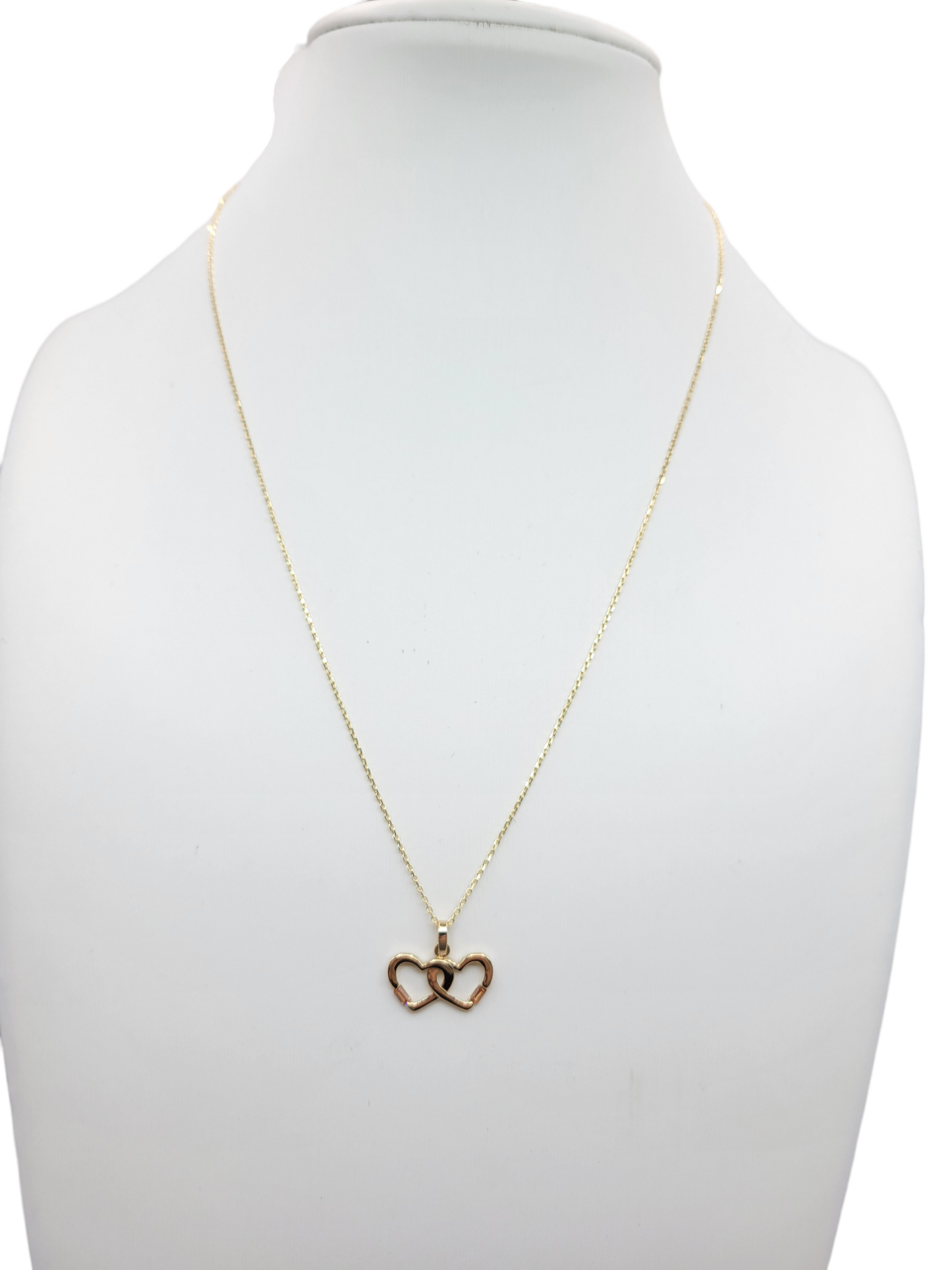 10K gold chain. Linked hearts. CZ stone. 18in. 1mm.