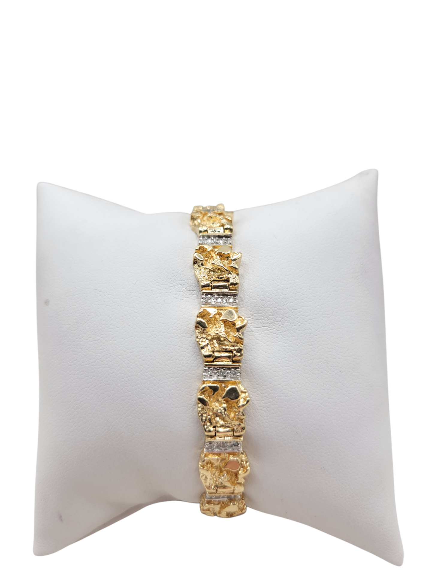 10K gold bracelet. nuget style. 6.5in. 9.4mm