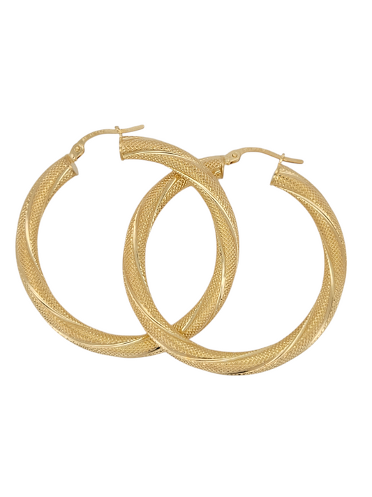 Gold earrings. Snowy. Thick. Size 5.