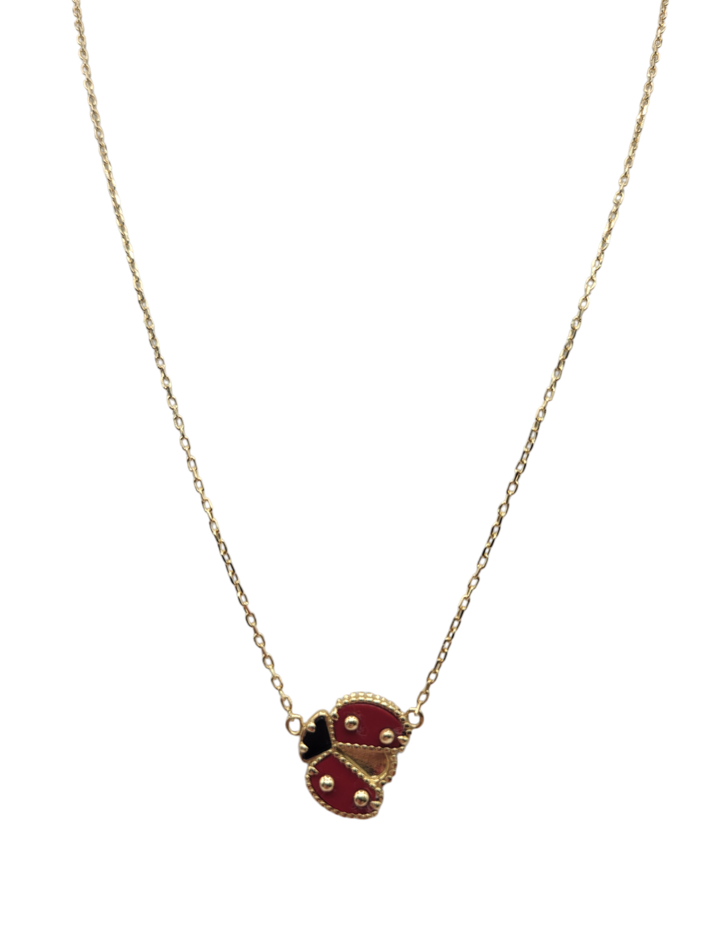 10K gold necklace with ladybug pendant . 18in . 1mm