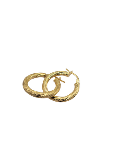 10K gold earrings. Thin snowy hoop. Size 1.